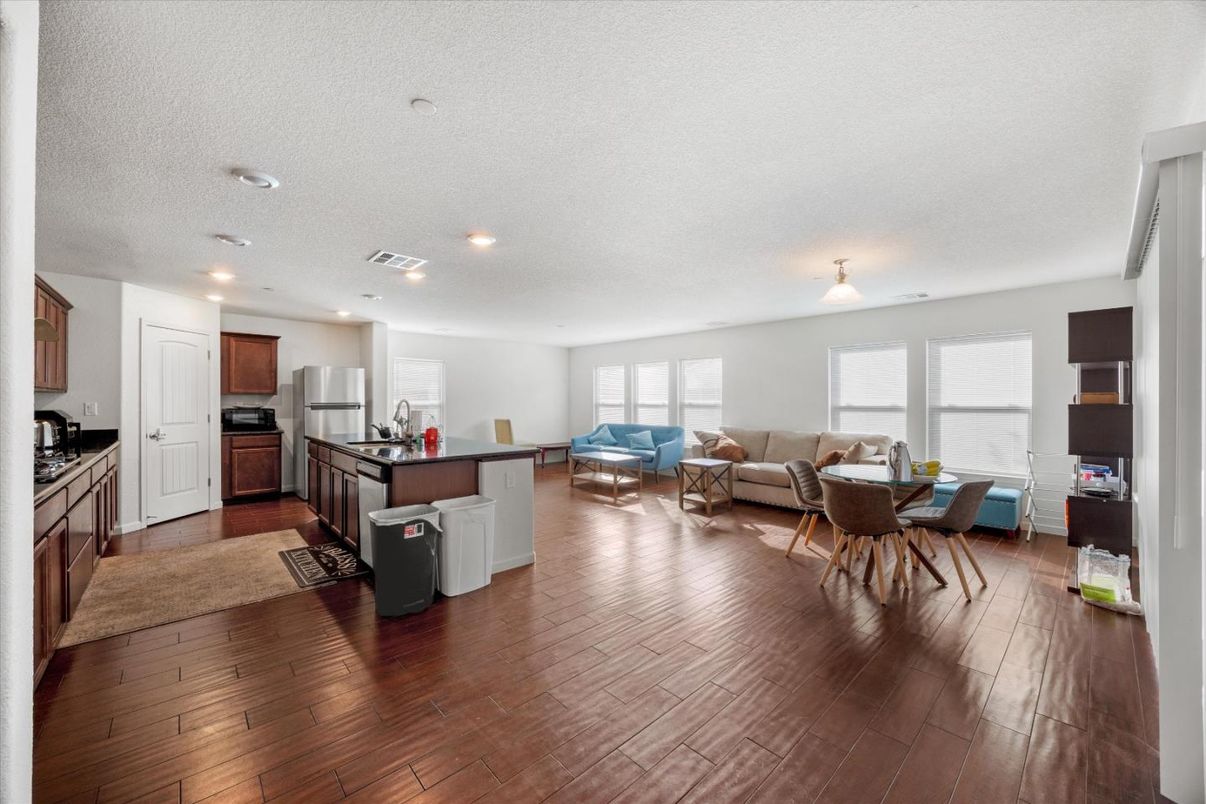 Dining room, Interior, Kitchen, Living room, Recessed Lighting, Stainless Steel Appliances, Wood Texture Flooring