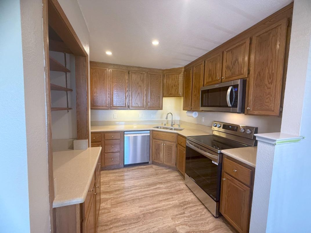 Interior, Kitchen, Recessed Lighting, Stainless Steel Appliances, Wood Texture Flooring