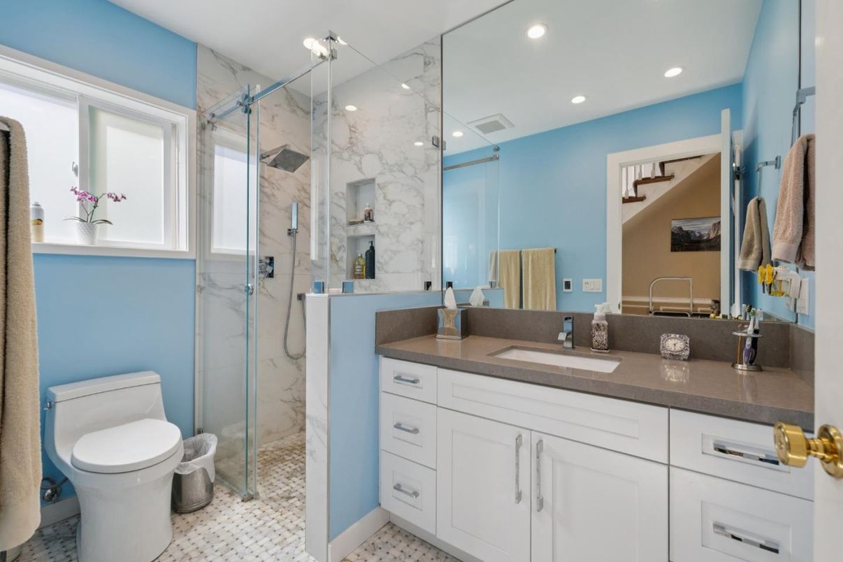 Bathroom, Dual Sink Vanities, Glass Shower, Interior, Marble Walls, Recessed Lighting