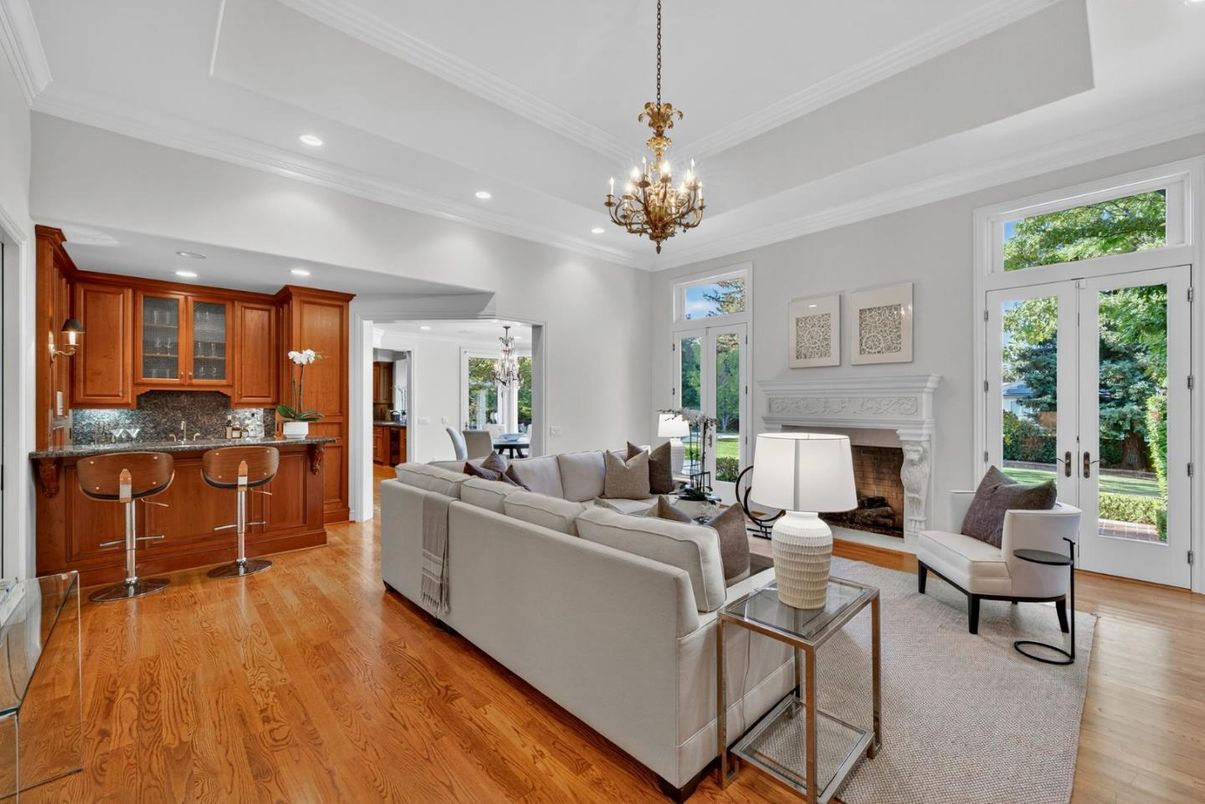 Chandelier, Dining room, Fireplace, Interior, Kitchen, Living room, Pendant Lights, Recessed Lighting, Wood Texture Flooring