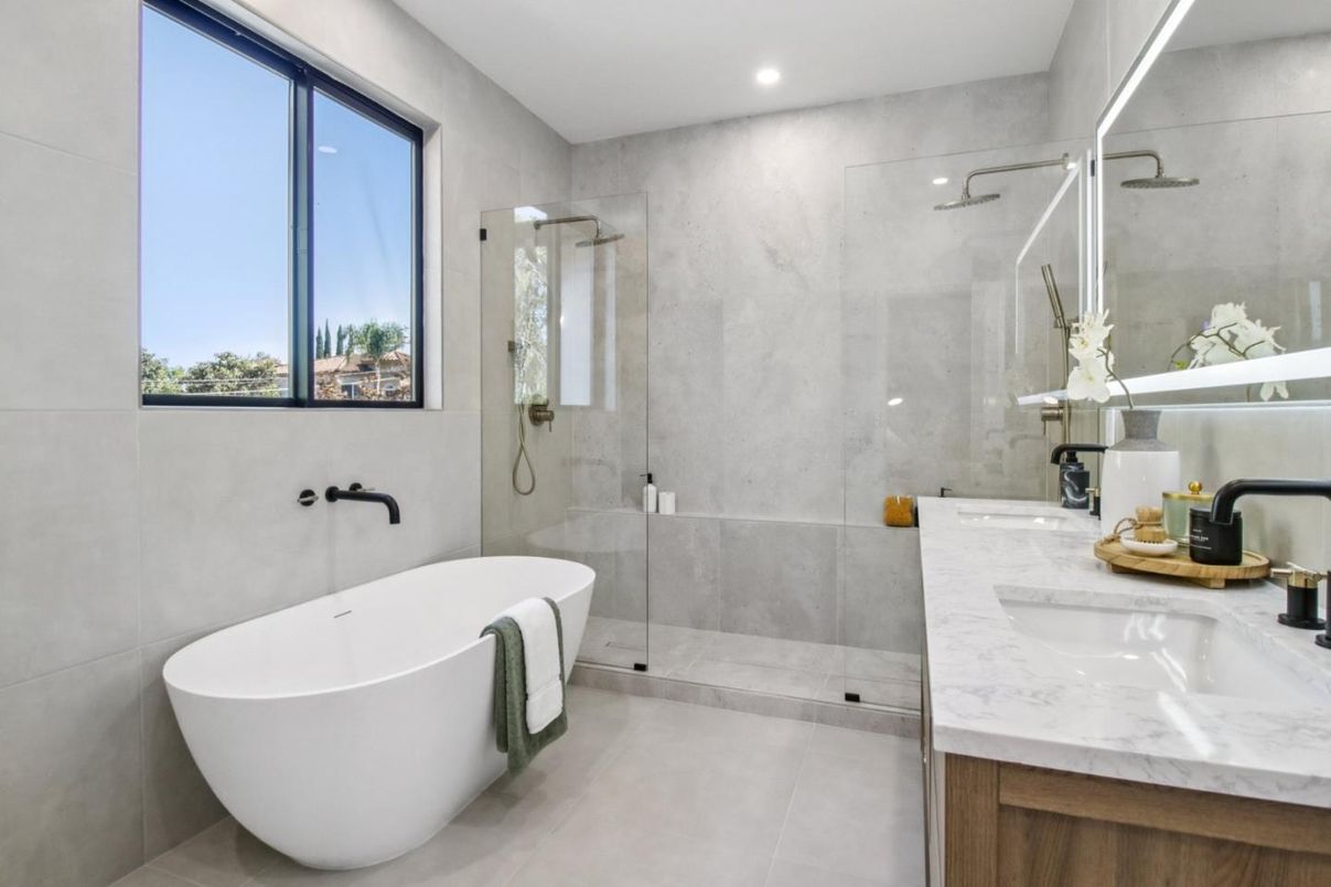 Bathroom, Dual Sink Vanities, Free Standing Baths, Glass Shower, Interior, Marble Walls, Recessed Lighting