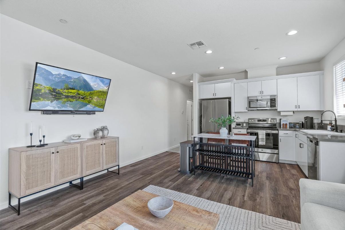 Dining room, Interior, Kitchen, Recessed Lighting, Stainless Steel Appliances, Wood Texture Flooring