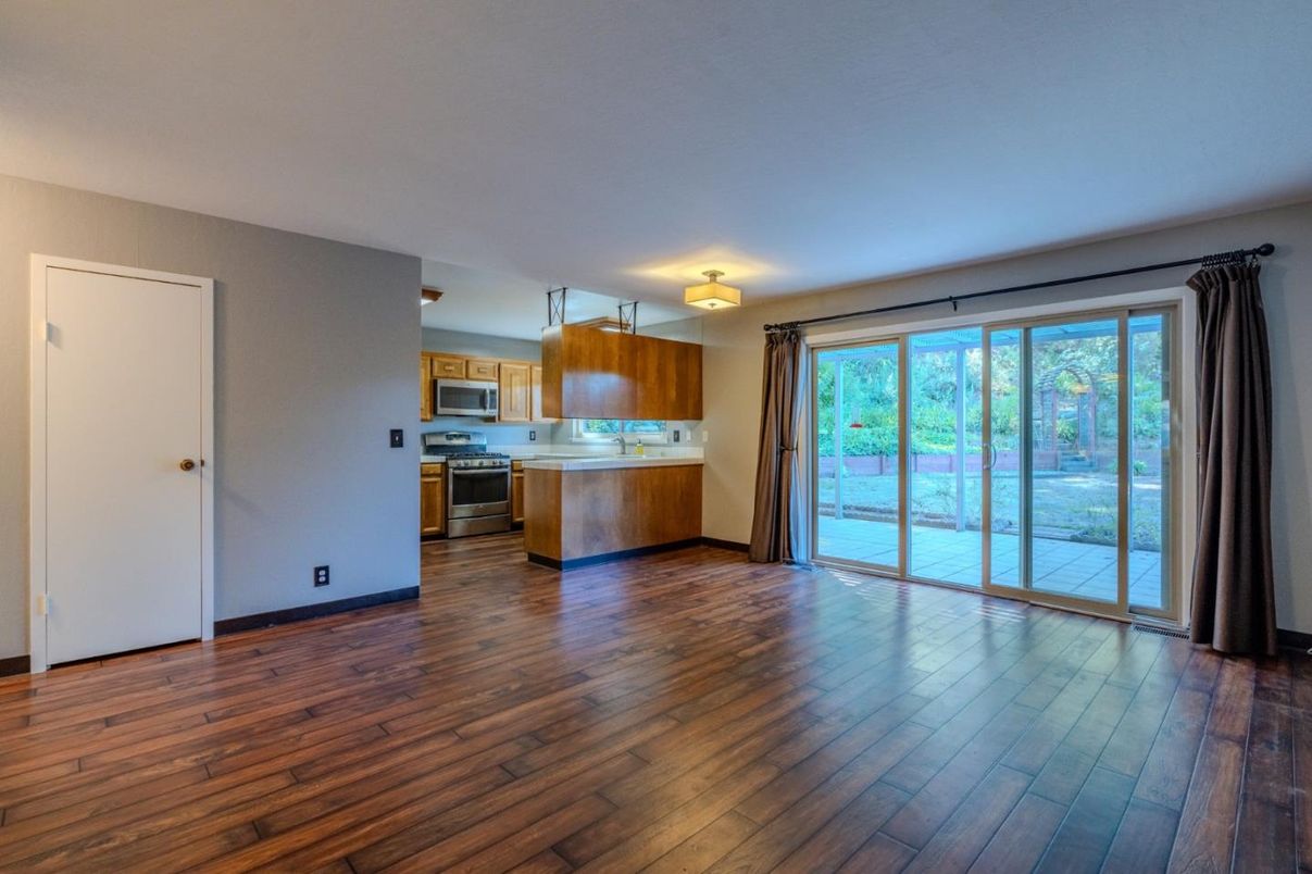 Empty room, Interior, Kitchen, Stainless Steel Appliances, Wood Texture Flooring