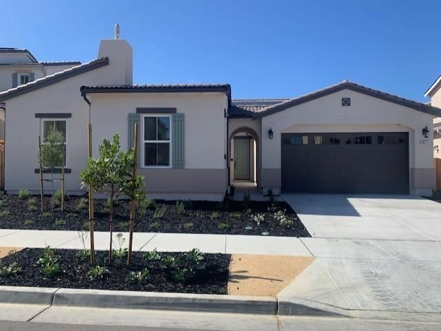 Attached, Exterior, Facade, Spanish Mediterranean