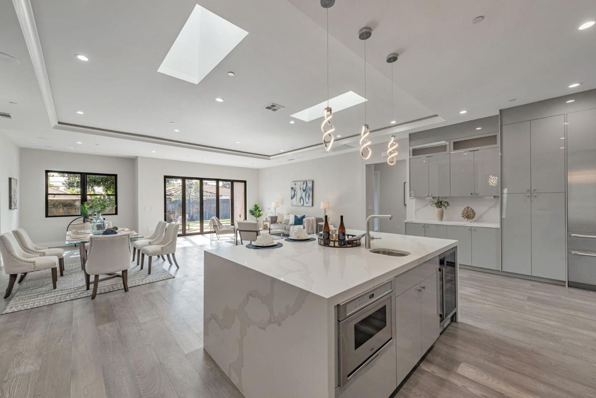 Dining room, Interior, Kitchen, Pendant Lights, Recessed Lighting, Stainless Steel Appliances, Wood Texture Flooring