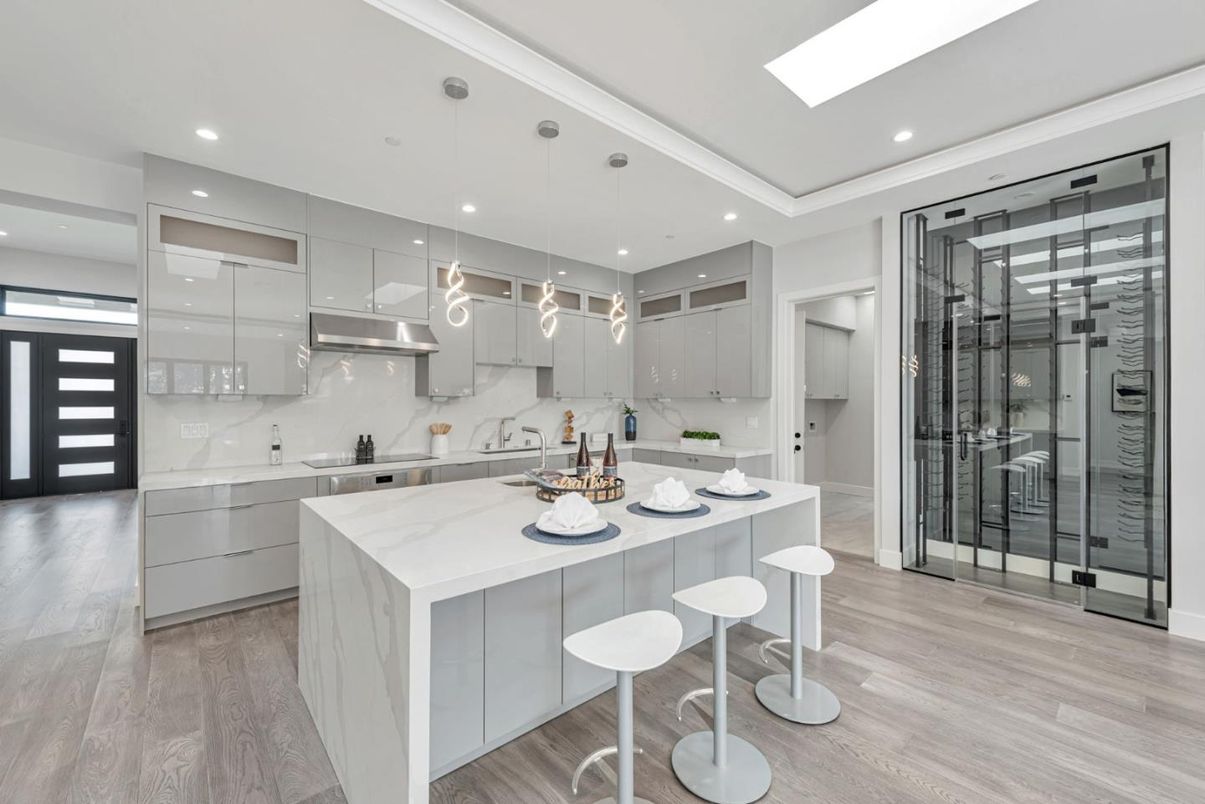 Interior, Kitchen, Marble Walls, Pendant Lights, Recessed Lighting, Stainless Steel Appliances, Wood Texture Flooring