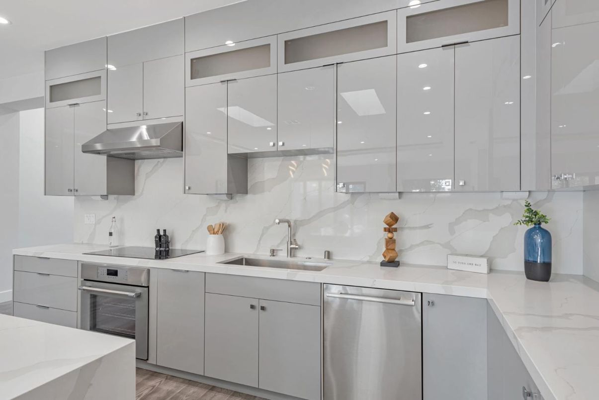 Interior, Kitchen, Marble Walls, Recessed Lighting, Stainless Steel Appliances, Wood Texture Flooring