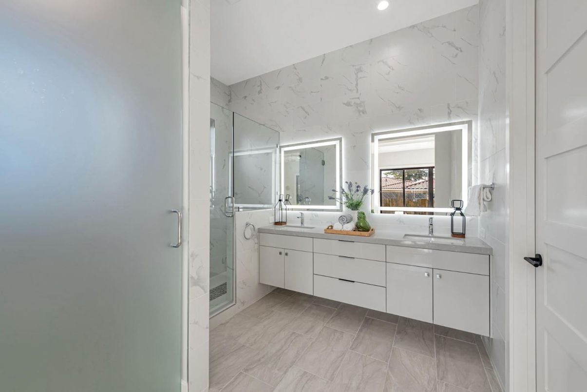 Bathroom, Dual Sink Vanities, Glass Shower, Interior, Marble, Marble Walls, Recessed Lighting