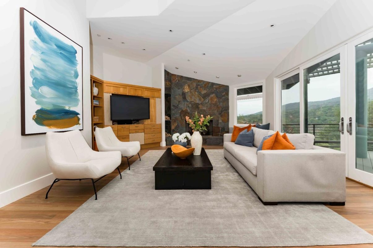 Fireplace, Interior, Living room, Recessed Lighting, Stone Walls, Wood Texture Flooring