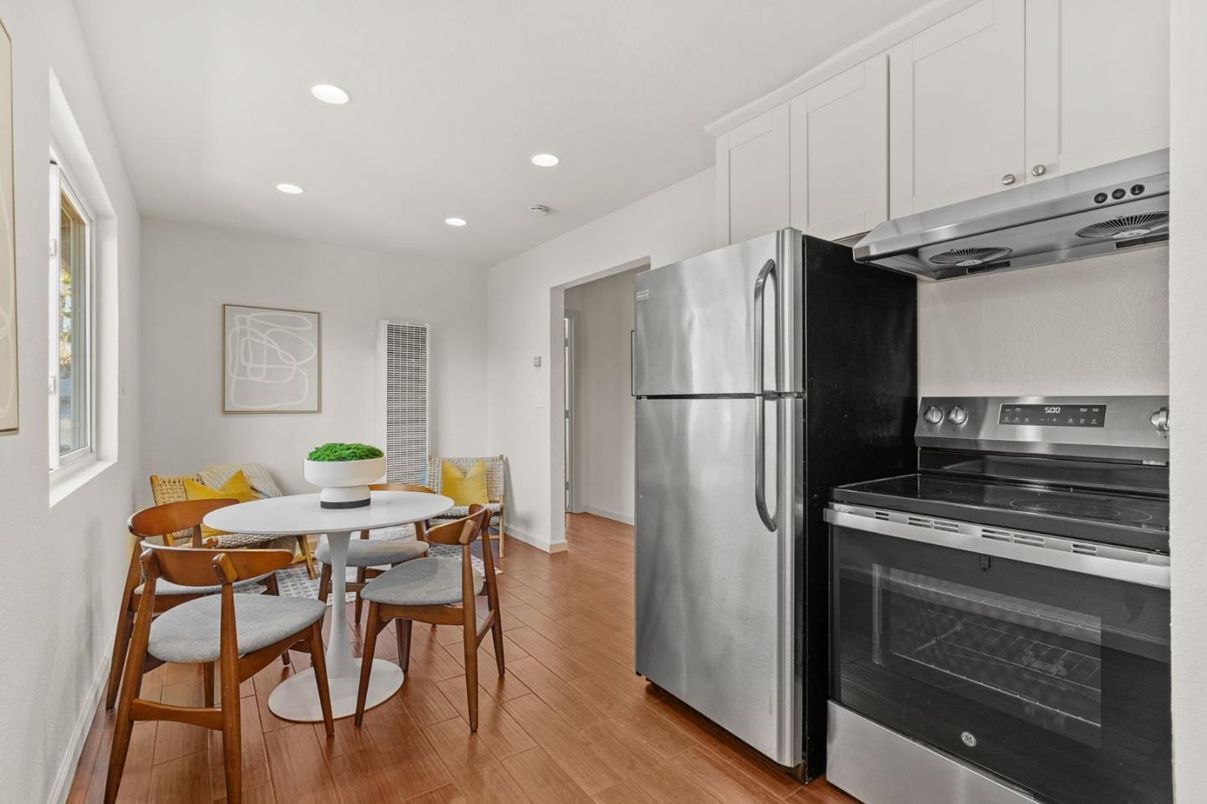 Dining room, Interior, Kitchen, Recessed Lighting, Stainless Steel Appliances, Wood Texture Flooring