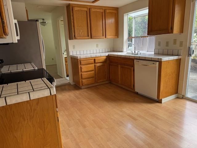 Interior, Kitchen, Tile Countertops, Wood Texture Flooring