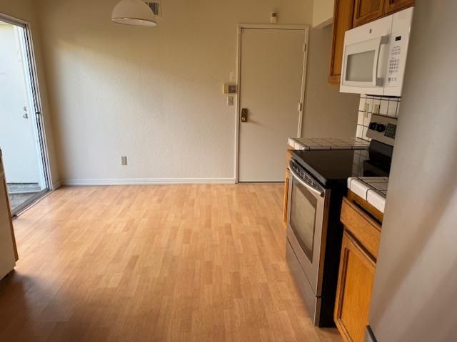 Interior, Kitchen, Tile Countertops, Wood Texture Flooring