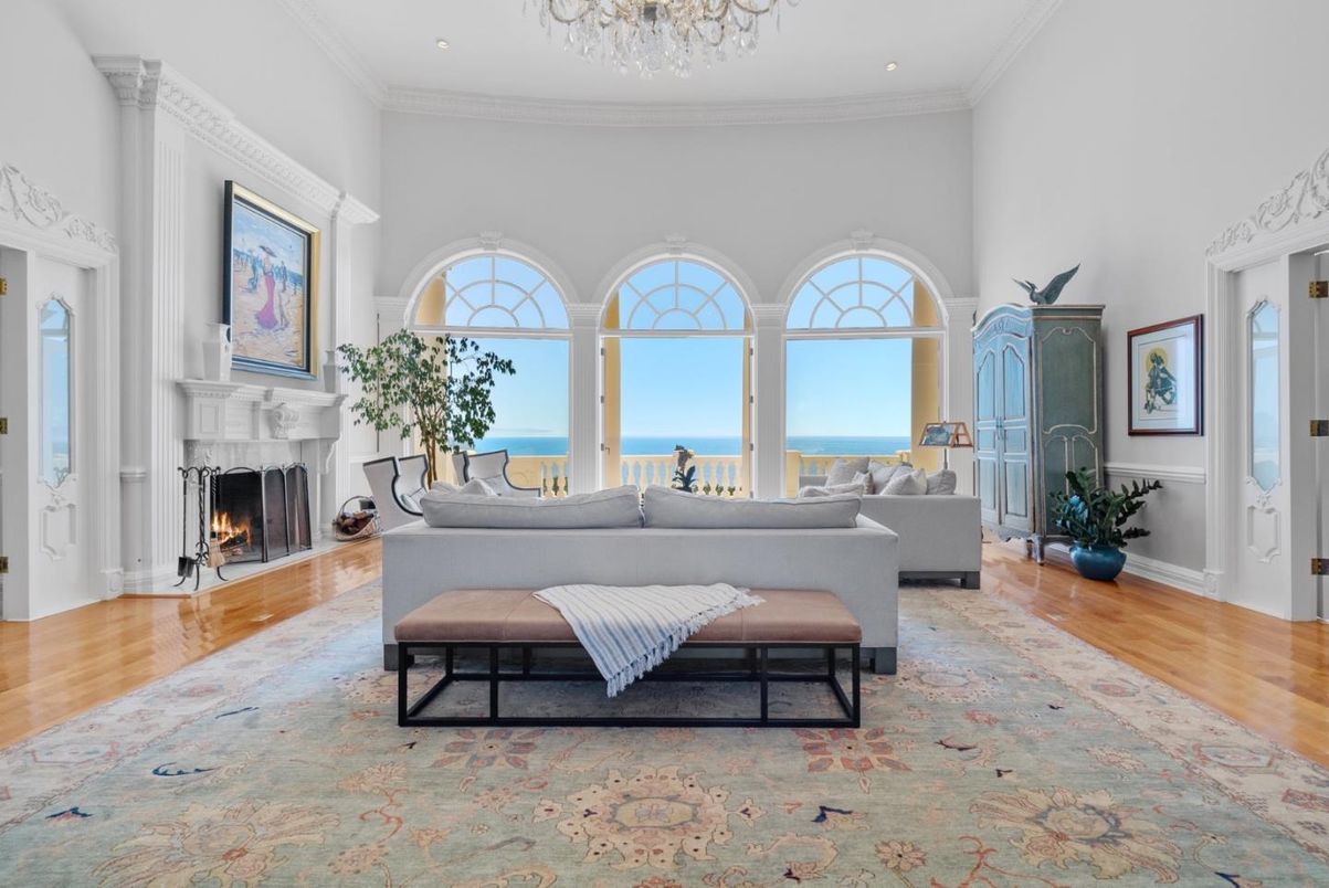 Chandelier, Fireplace, Interior, Living room, Recessed Lighting, Water, Wood Texture Flooring