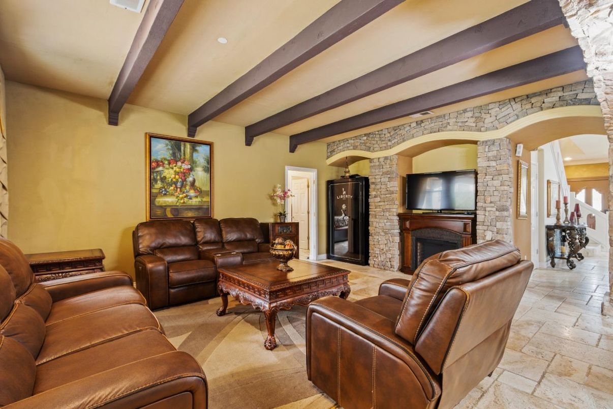Fireplace, Interior, Living room, Recessed Lighting, Stone Walls, Wooden Beams