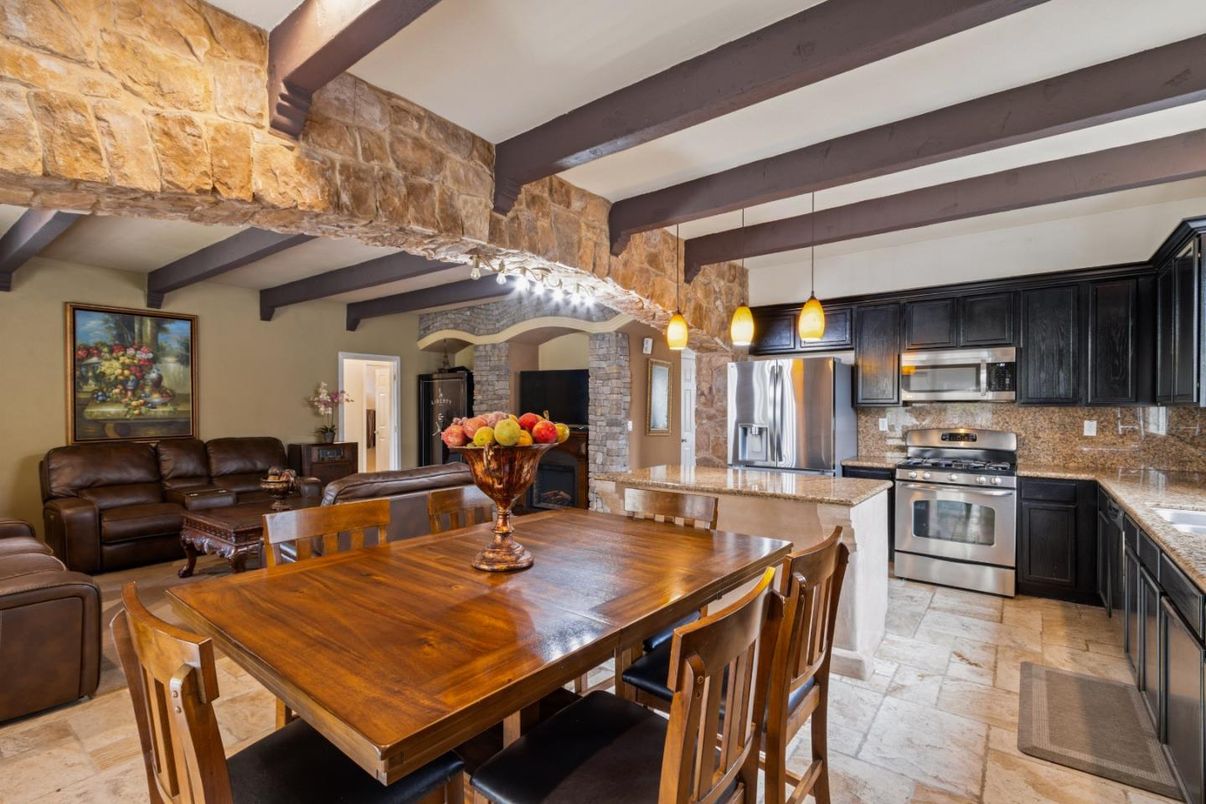Dining room, Interior, Kitchen, Living room, Pendant Lights, Stainless Steel Appliances, Stone Walls, Wooden Beams