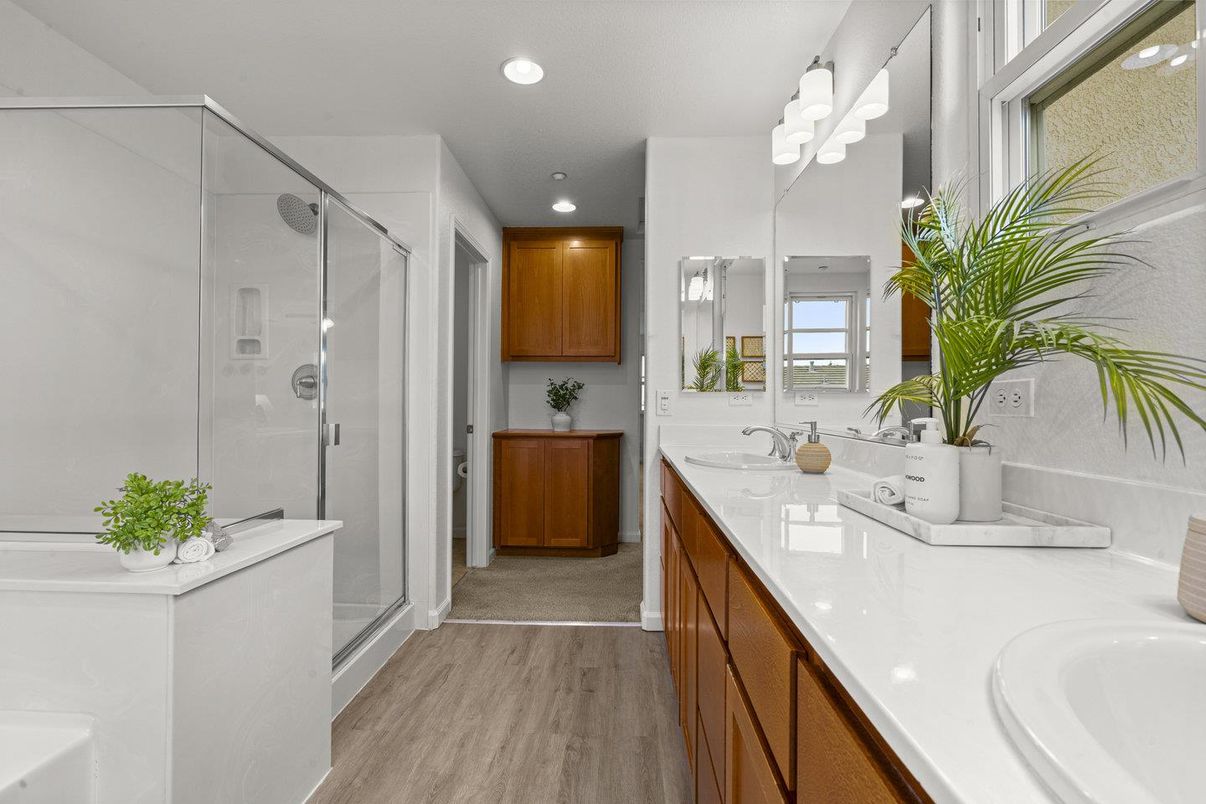 Bathroom, Dual Sink Vanities, Glass Shower, Interior, Recessed Lighting, Wood Texture Flooring