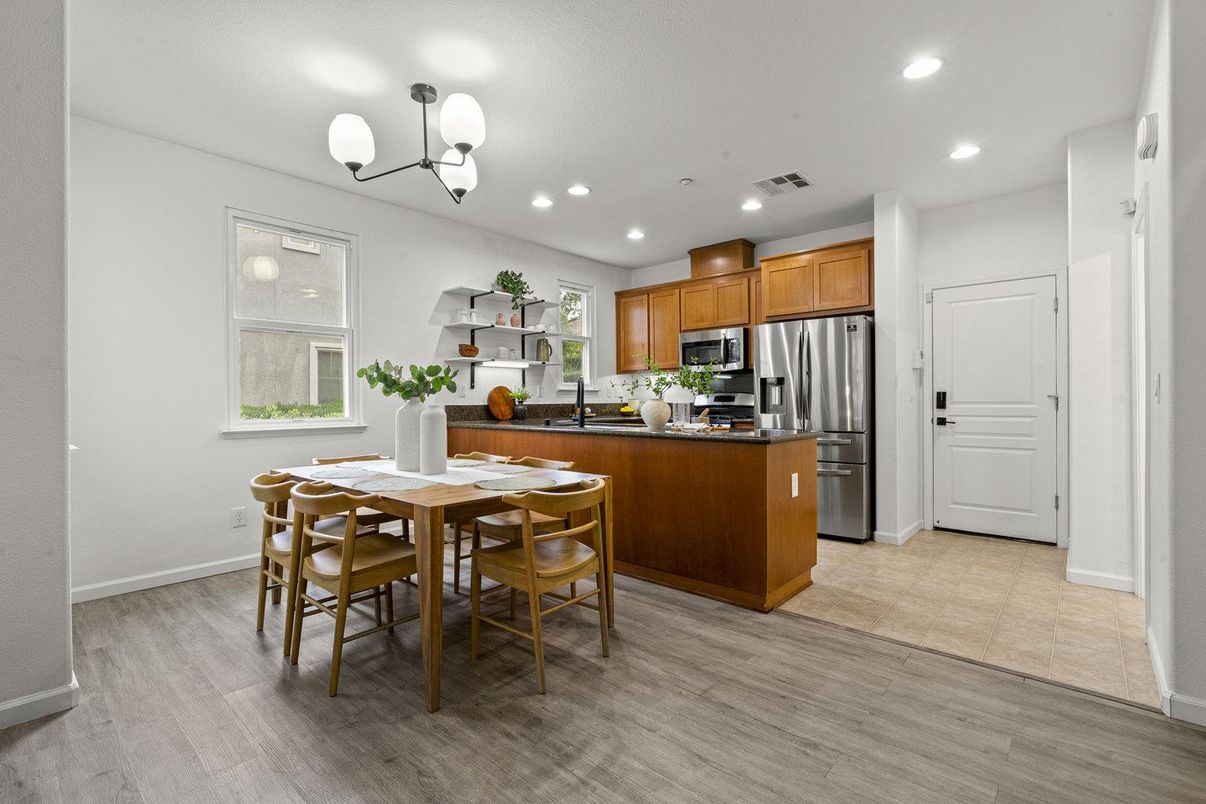 Dining room, Interior, Kitchen, Pendant Lights, Recessed Lighting, Stainless Steel Appliances, Wood Texture Flooring