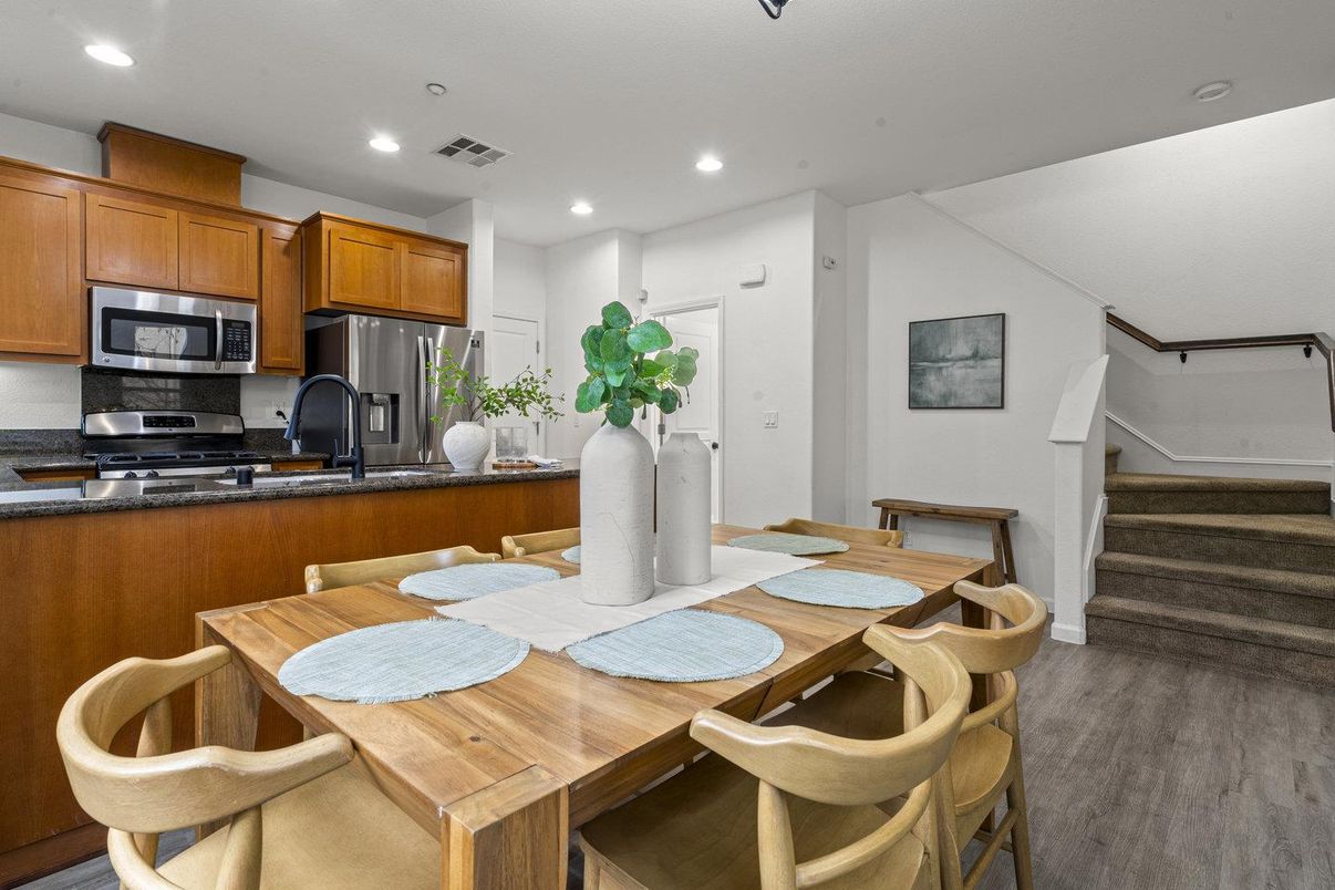 Dining room, Interior, Kitchen, Recessed Lighting, Stainless Steel Appliances, Wood Texture Flooring