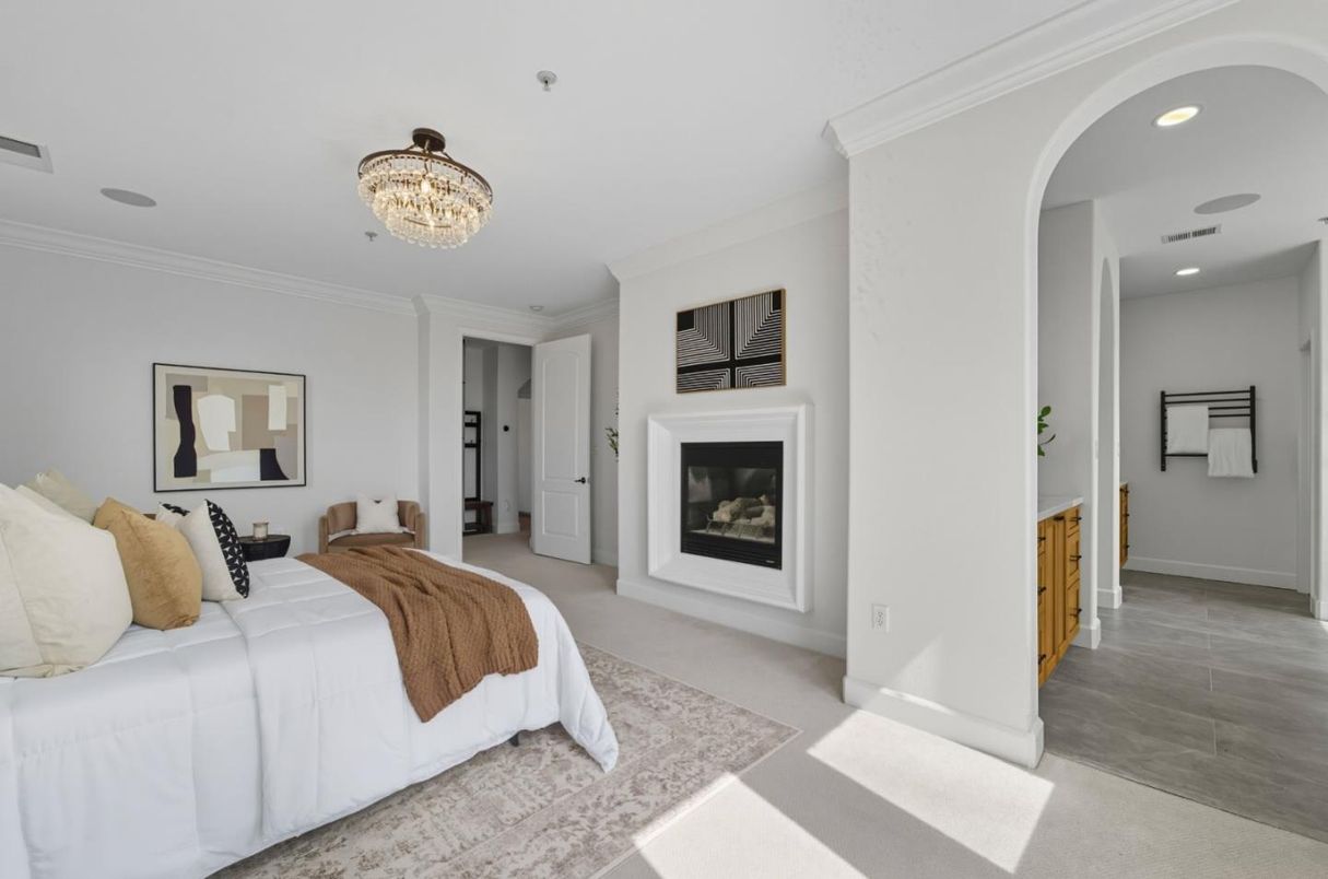 Bedroom, Chandelier, Fireplace, Interior, Recessed Lighting, Wood Texture Flooring