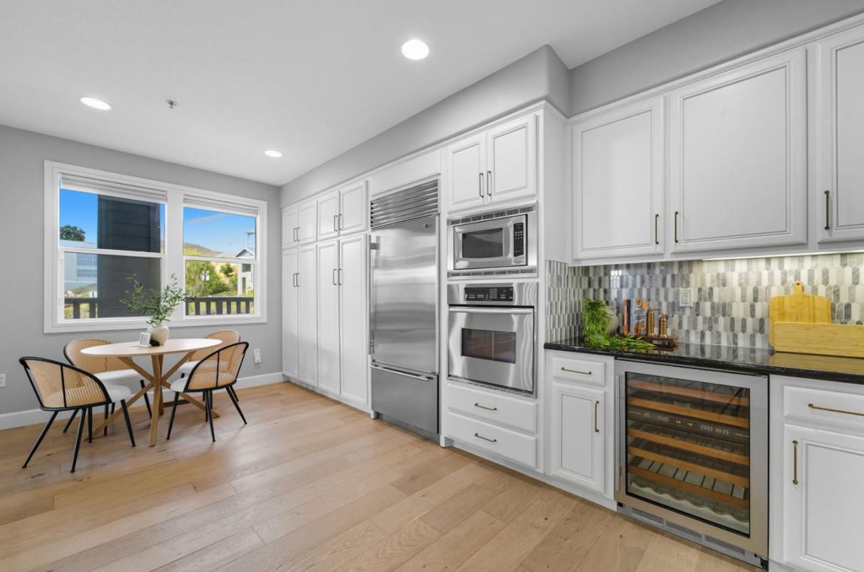 Dining room, Interior, Kitchen, Recessed Lighting, Stainless Steel Appliances, Wood Texture Flooring