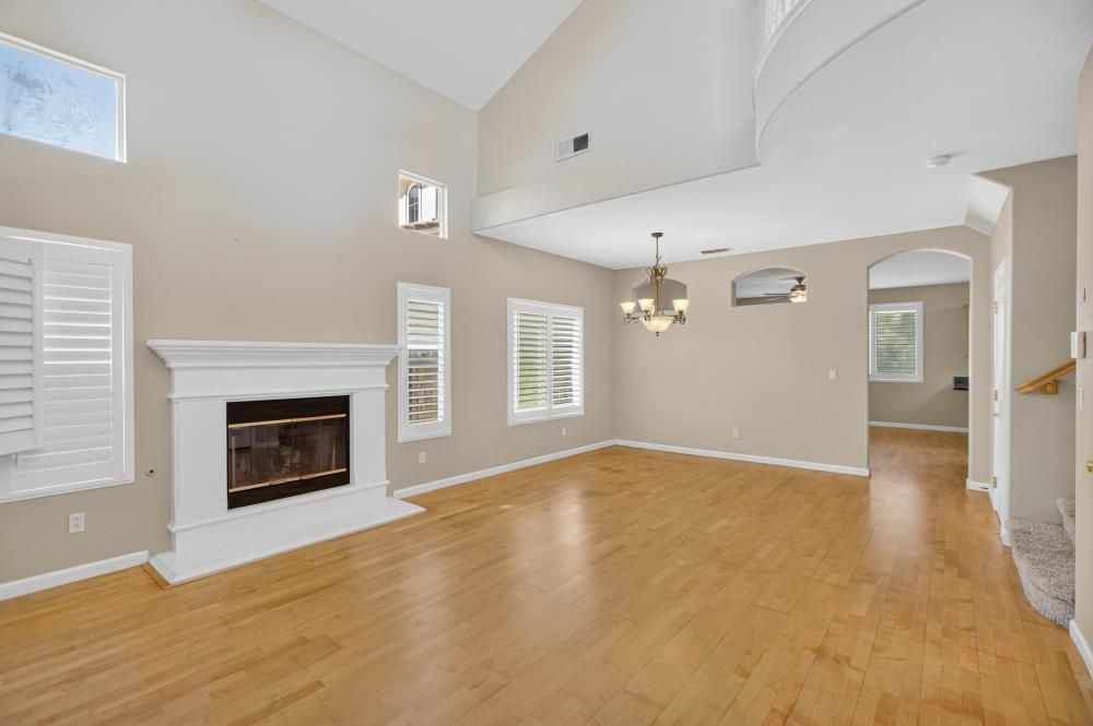 Chandelier, Empty room, Fireplace, Interior, Wood Texture Flooring
