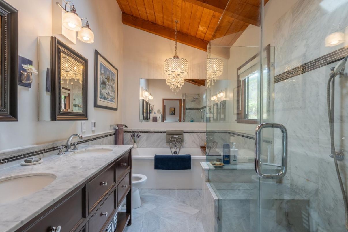 Bathroom, Chandelier, Dual Sink Vanities, Glass Shower, Interior, Marble, Marble Walls, Wooden Ceilings