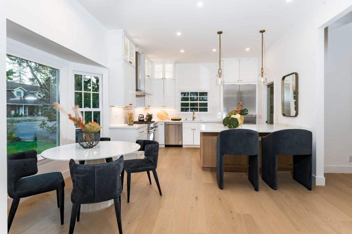 Dining room, Interior, Kitchen, Pendant Lights, Recessed Lighting, Stainless Steel Appliances, Wood Texture Flooring