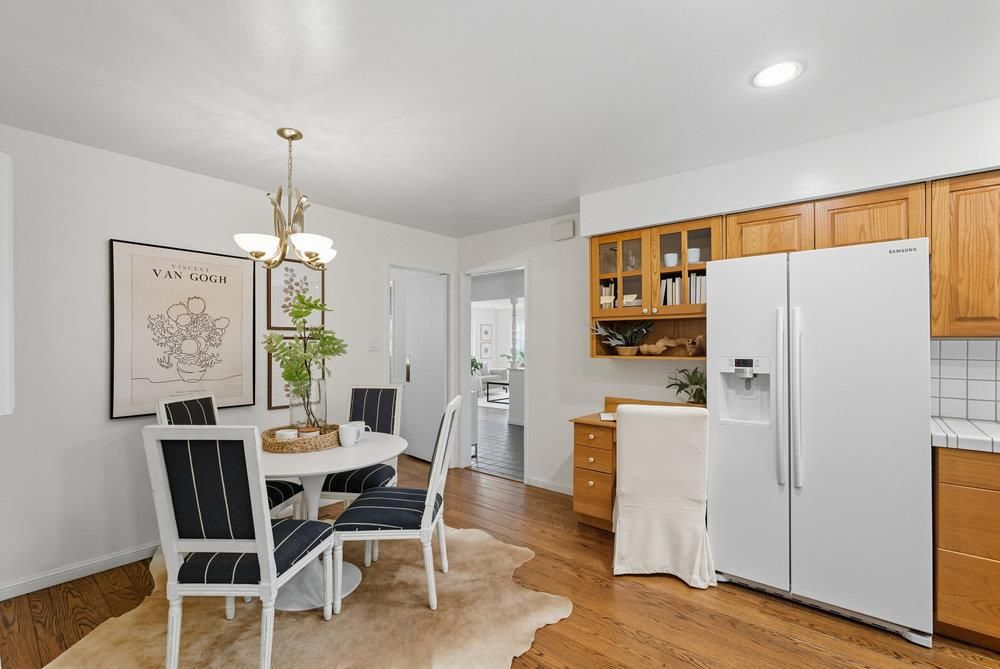 Chandelier, Dining room, Interior, Kitchen, Recessed Lighting, Tile Countertops, Wood Texture Flooring