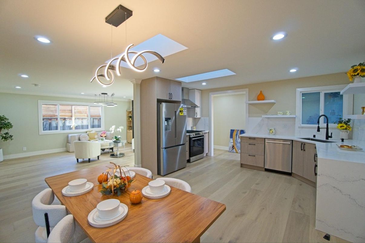 Dining room, Interior, Kitchen, Pendant Lights, Recessed Lighting, Stainless Steel Appliances, Wood Texture Flooring