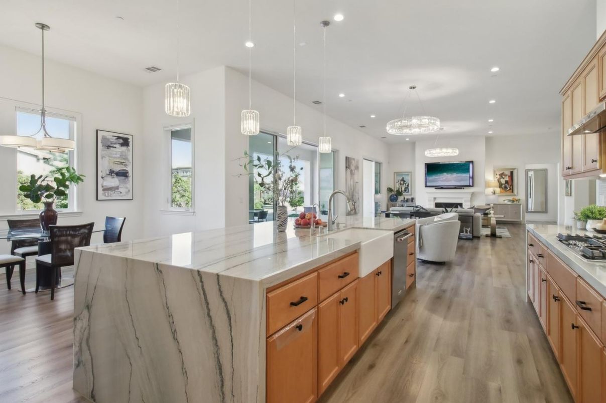 Dining room, Fireplace, Interior, Kitchen, Living room, Pendant Lights, Recessed Lighting, Stainless Steel Appliances, Wood Texture Flooring