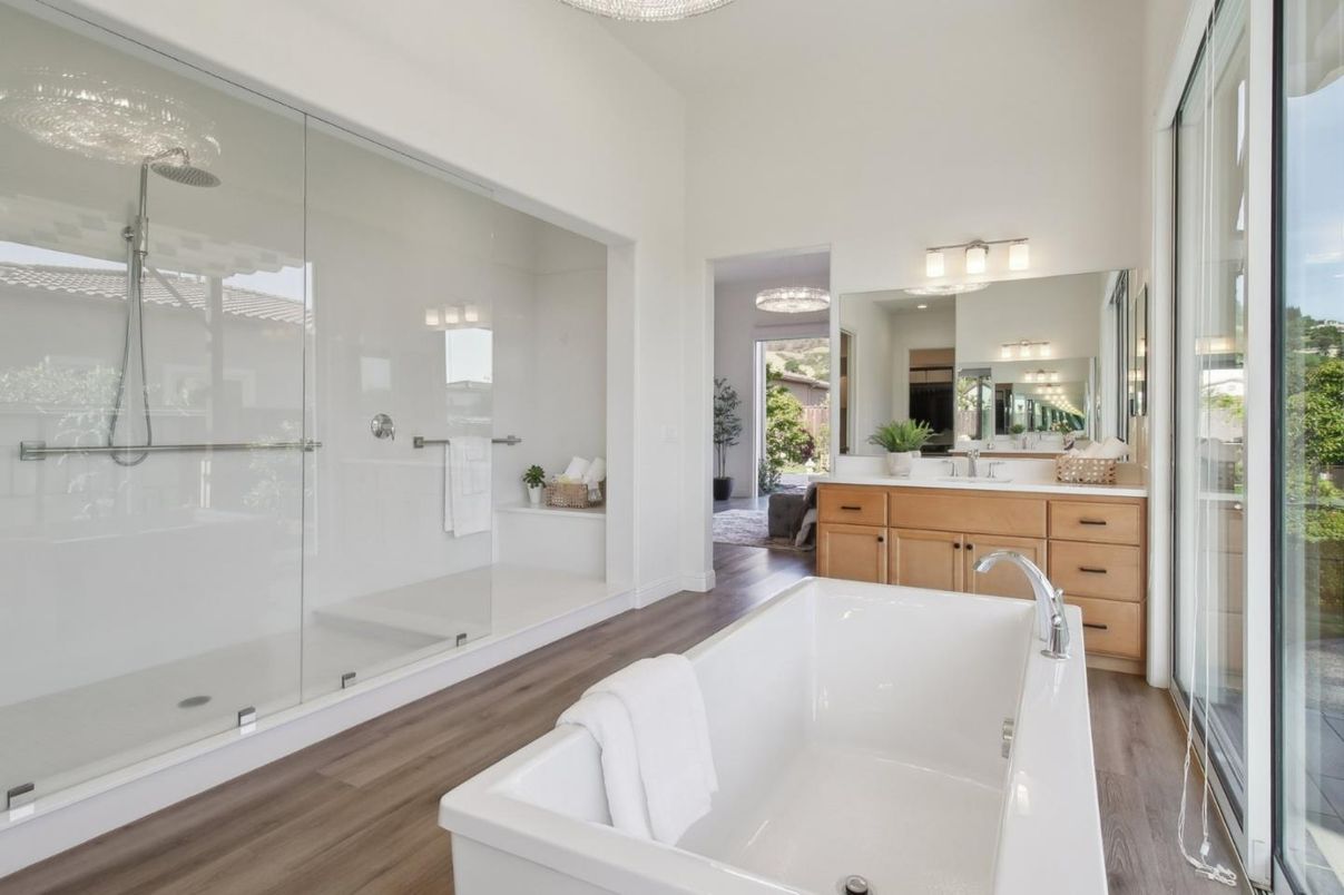 Bathroom, Dual Sink Vanities, Free Standing Baths, Glass Shower, Interior, Wood Texture Flooring