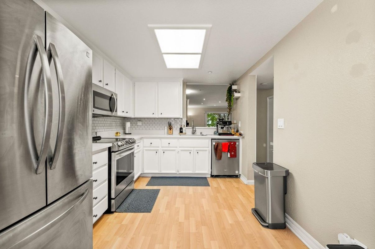 Interior, Kitchen, Recessed Lighting, Stainless Steel Appliances, Wood Texture Flooring