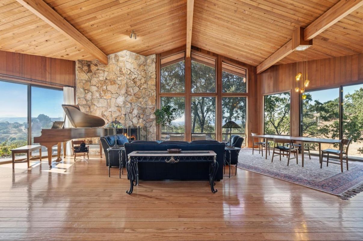 Chandelier, Dining room, Fireplace, Interior, Living room, Piano, Stone Walls, Wooden Beams, Wooden Ceilings, Wood Texture Flooring, Wooden Walls