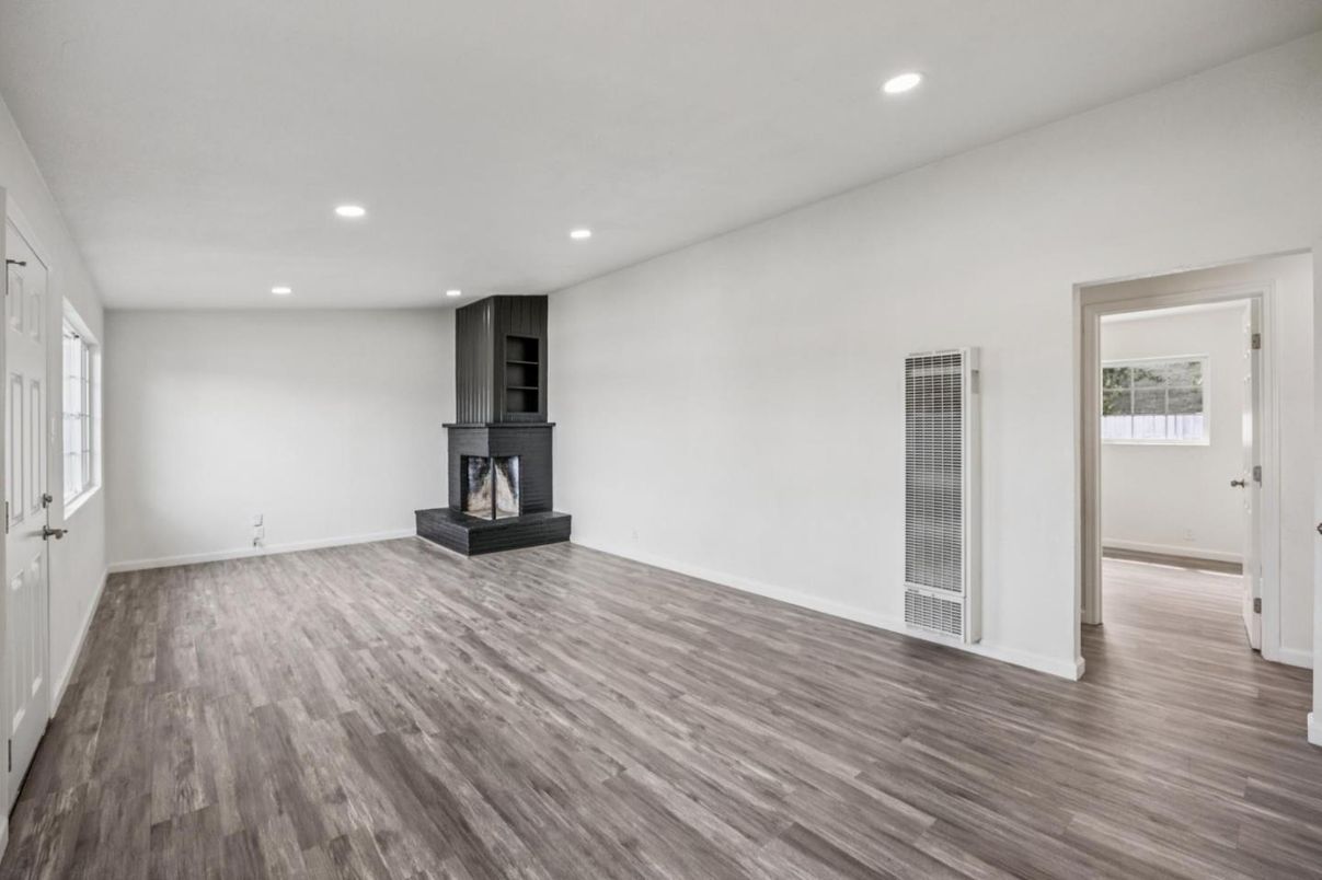 Empty room, Fireplace, Interior, Recessed Lighting, Wood Texture Flooring
