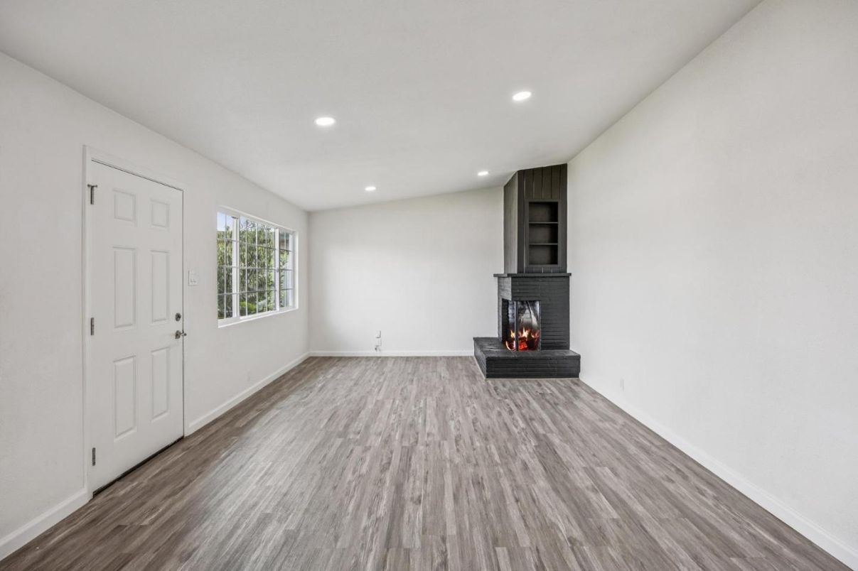 Empty room, Fireplace, Interior, Recessed Lighting, Wood Texture Flooring