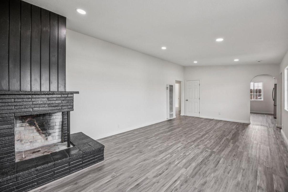 Empty room, Fireplace, Interior, Recessed Lighting, Wood Texture Flooring