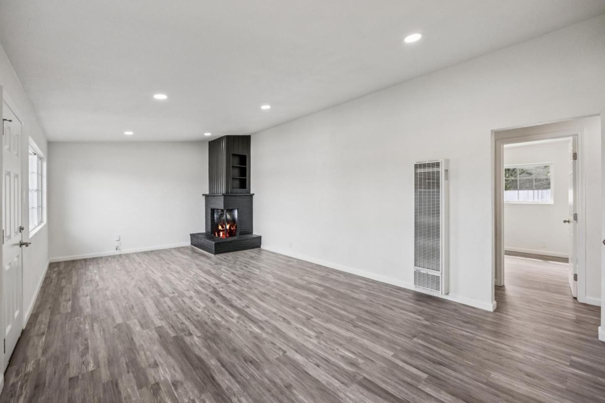 Empty room, Fireplace, Interior, Recessed Lighting, Wood Texture Flooring