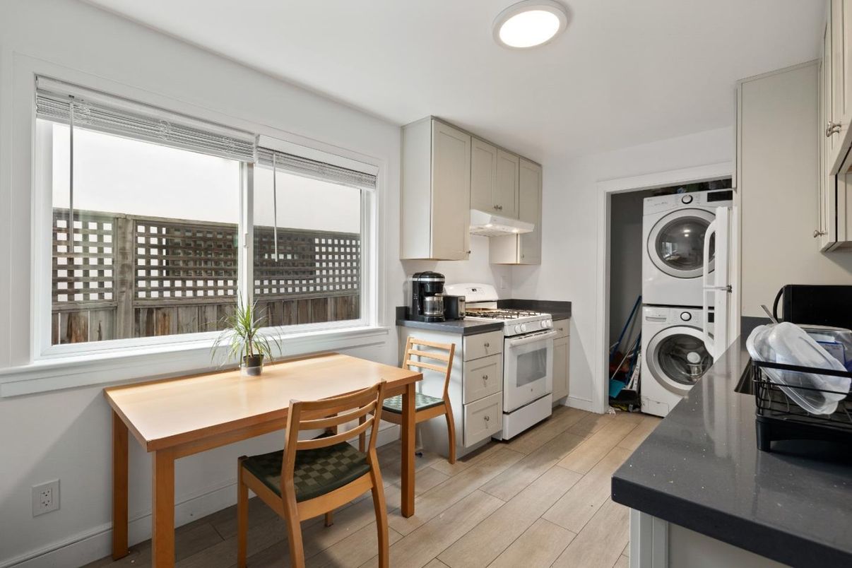 Interior, Kitchen, Recessed Lighting, Washer, Wood Texture Flooring