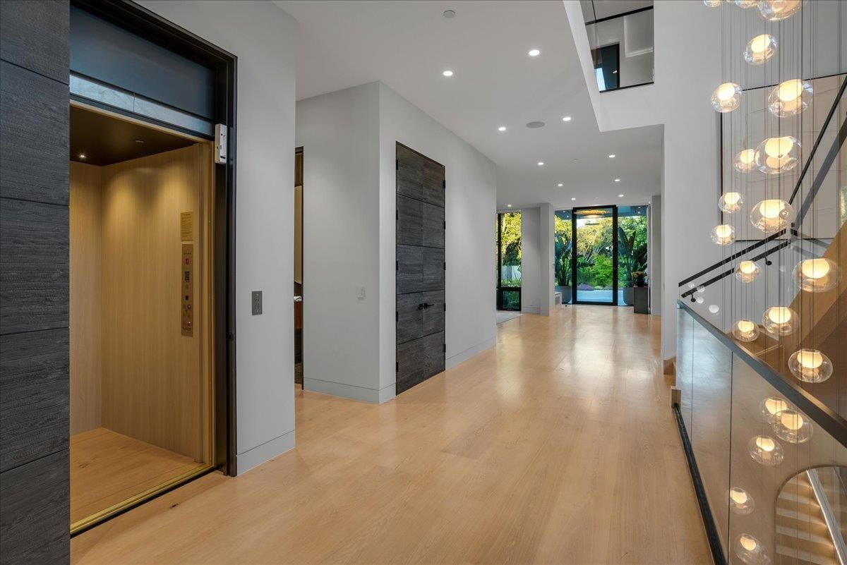Elevator, Interior, Pendant Lights, Recessed Lighting, Wood Texture Flooring