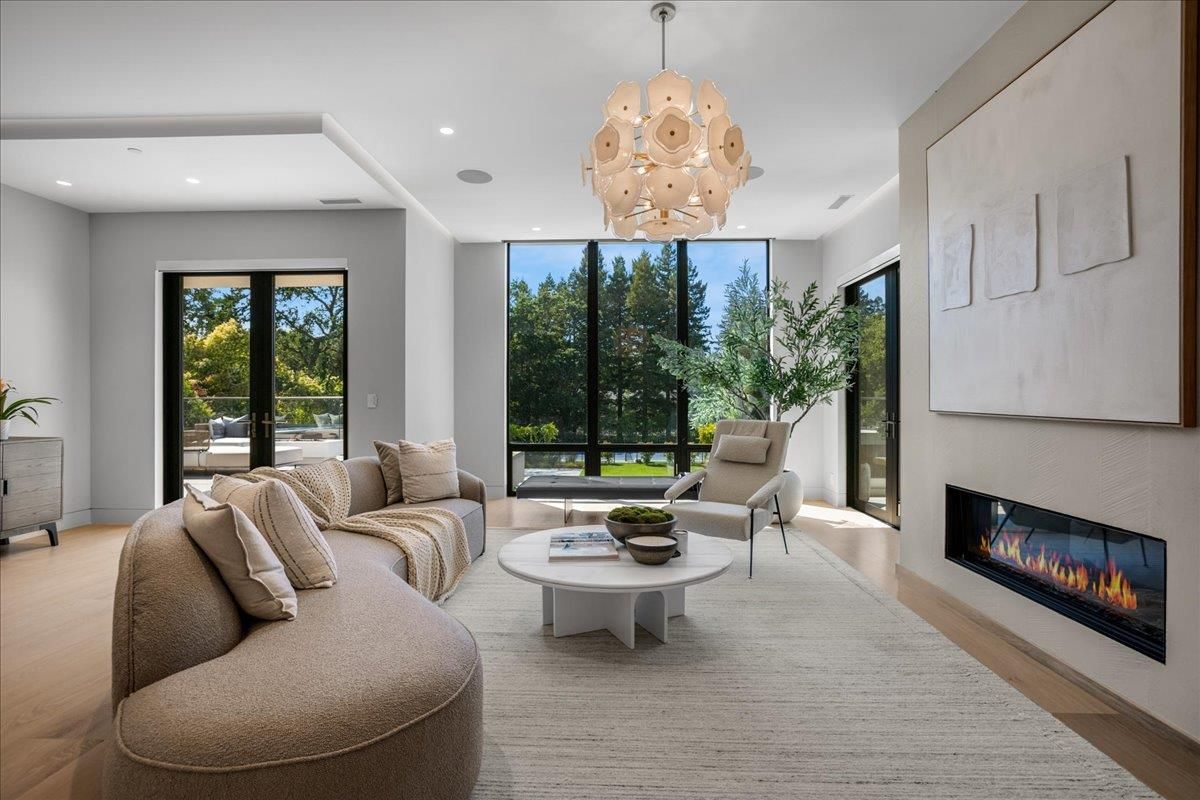 Chandelier, Fireplace, Interior, Living room, Recessed Lighting, Wood Texture Flooring