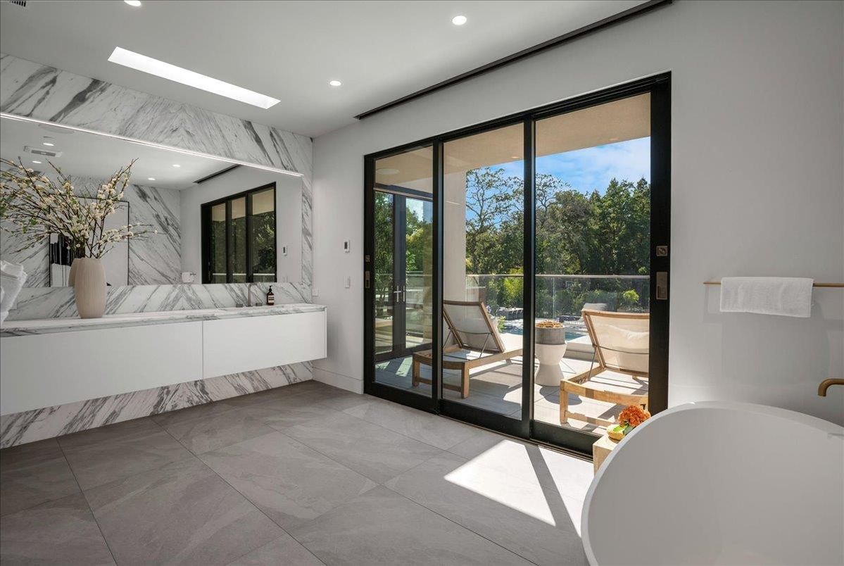 Bathroom, Dual Sink Vanities, Free Standing Baths, Interior, Marble, Marble Walls, Recessed Lighting