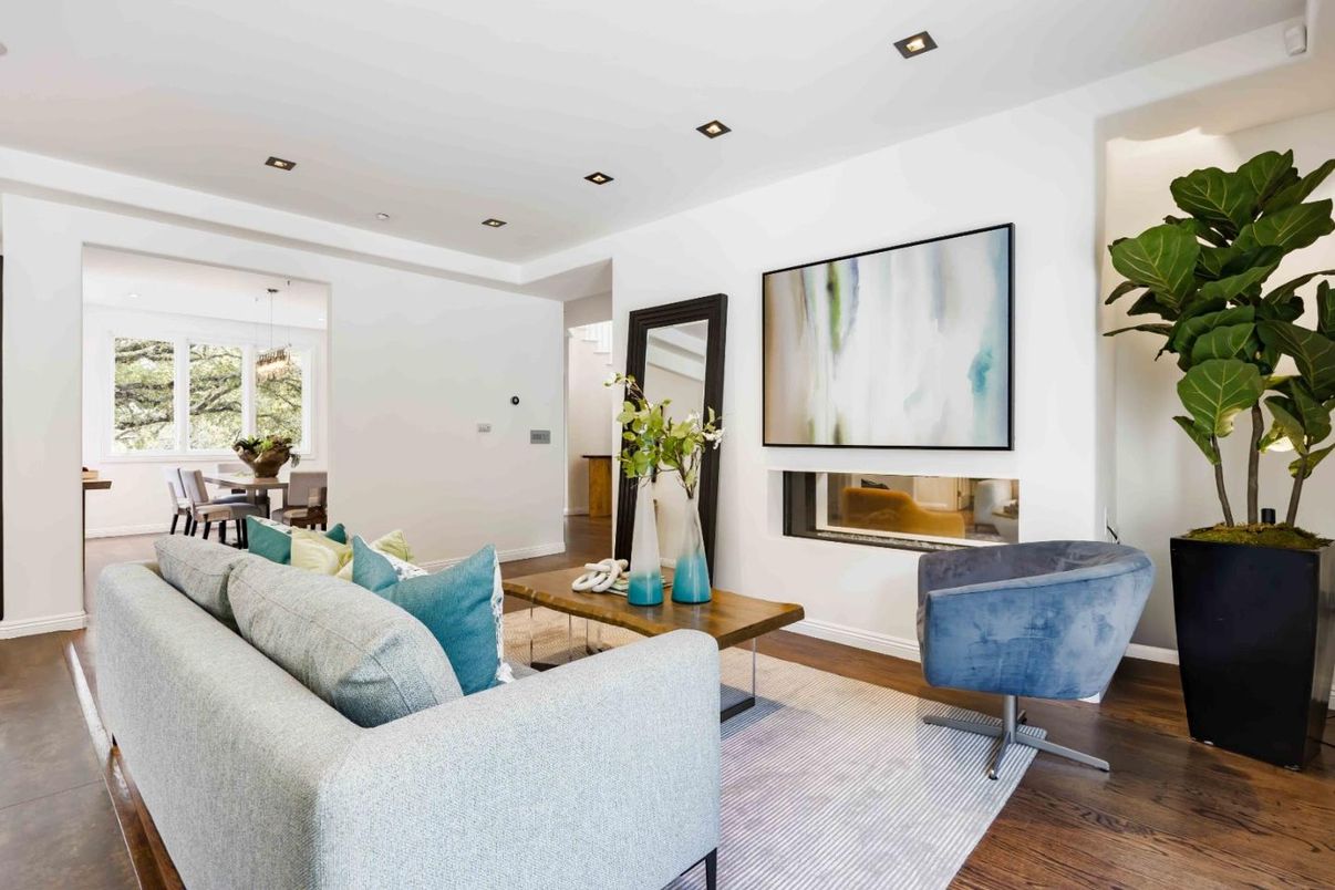 Dining room, Fireplace, Interior, Living room, Recessed Lighting, Wood Texture Flooring