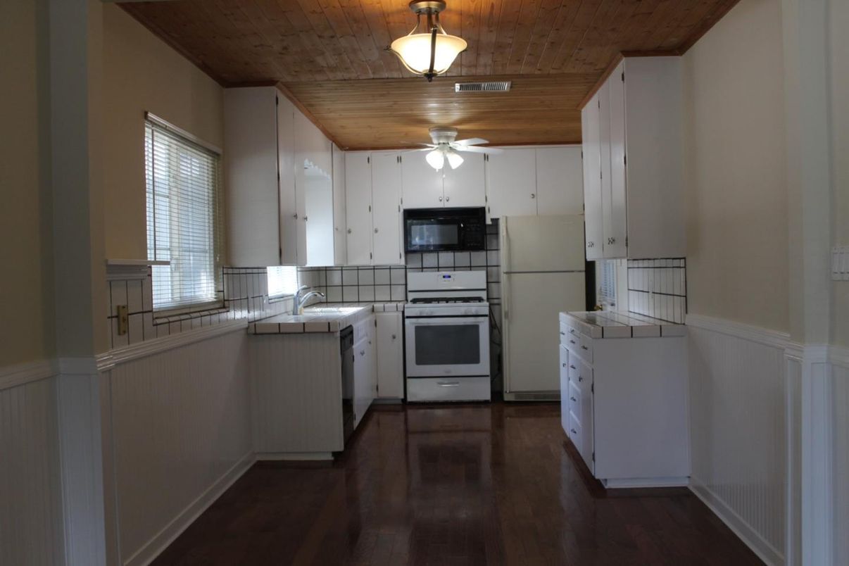 Interior, Kitchen, Tile Countertops, Wooden Ceilings, Wood Texture Flooring