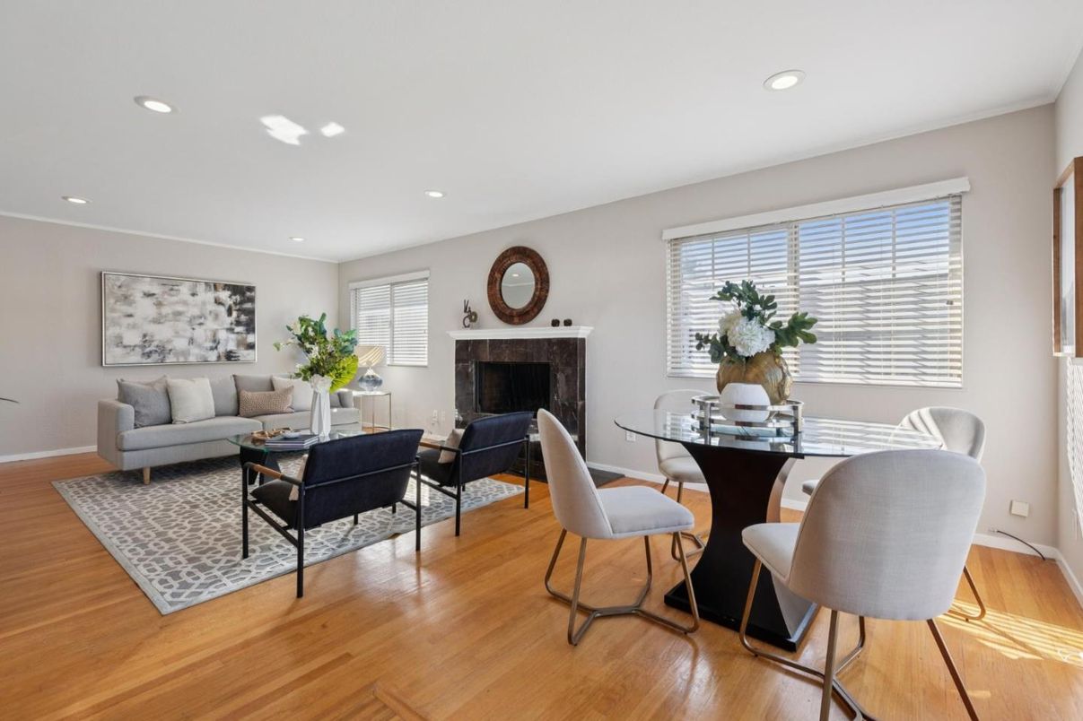 Dining room, Fireplace, Interior, Living room, Recessed Lighting, Wood Texture Flooring
