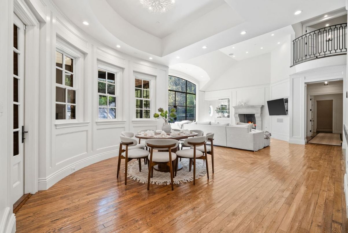 Dining room, Fireplace, Interior, Living room, Recessed Lighting, Wood Texture Flooring