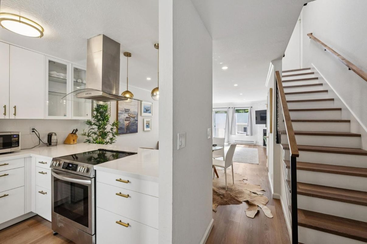 Dining room, Interior, Kitchen, Pendant Lights, Recessed Lighting, Stainless Steel Appliances, Wood Texture Flooring