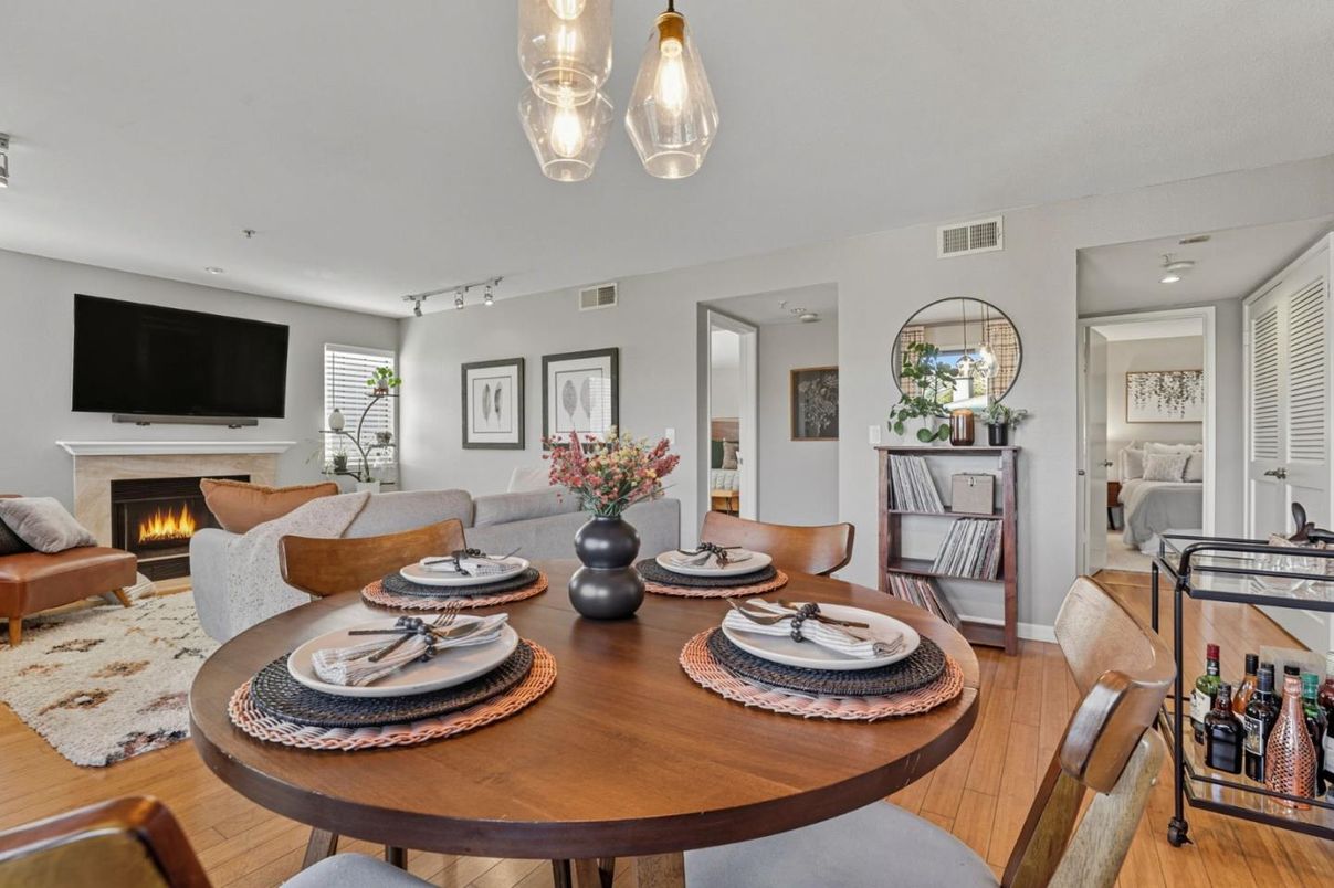 Dining room, Fireplace, Interior, Living room, Recessed Lighting, Wood Texture Flooring