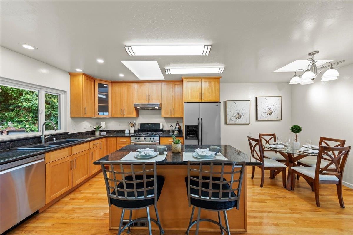 Dining room, Interior, Kitchen, Recessed Lighting, Stainless Steel Appliances, Wood Texture Flooring