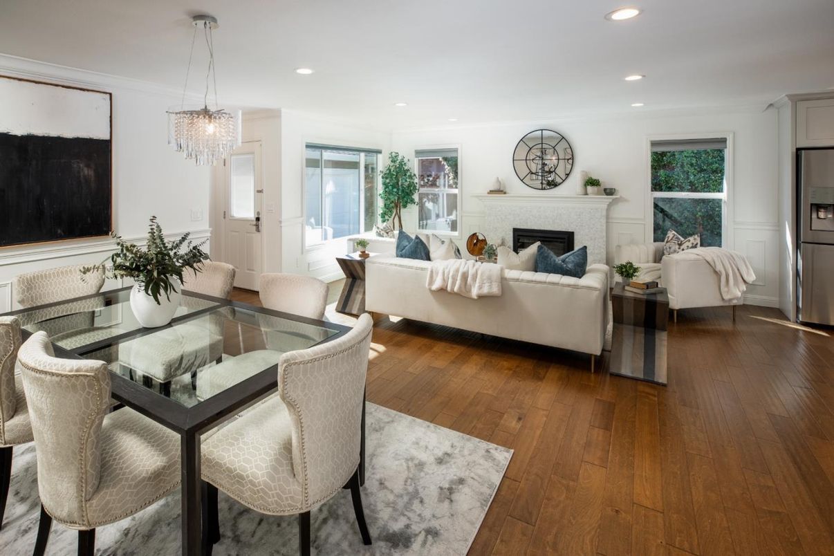 Dining room, Fireplace, Interior, Living room, Pendant Lights, Recessed Lighting, Wood Texture Flooring