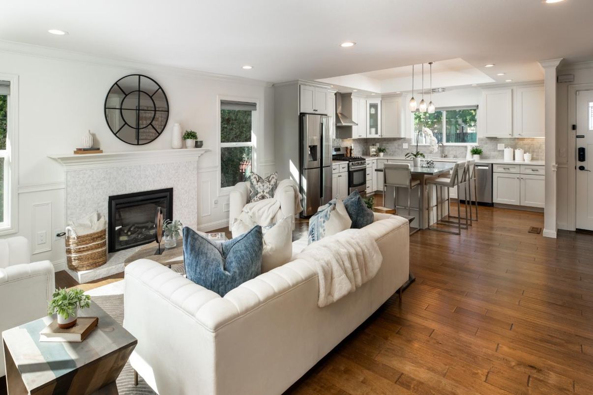 Fireplace, Interior, Kitchen, Living room, Pendant Lights, Recessed Lighting, Stainless Steel Appliances, Wood Texture Flooring